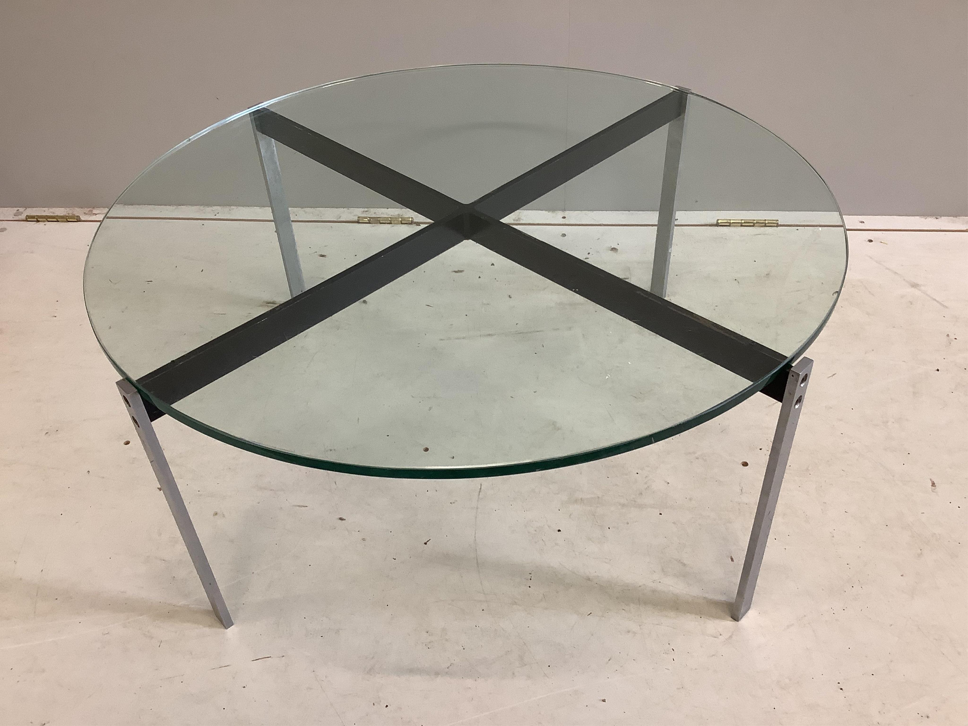 A mid century design circular glass coffee table, diameter 84cm, height 36cm. Condition - fair